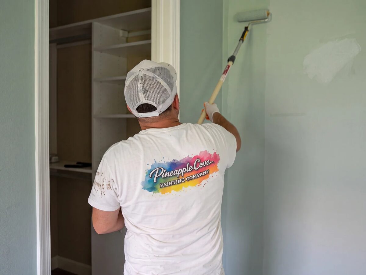 Pineapple Cove Painting crew rolling fresh paint on an interior wall of a Treasure Coast home